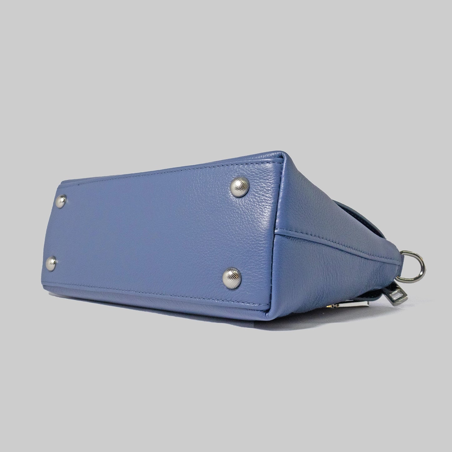 JELOUS Cortese luxury leather handbag in blue with silver turn-lock closure and detachable strap.
