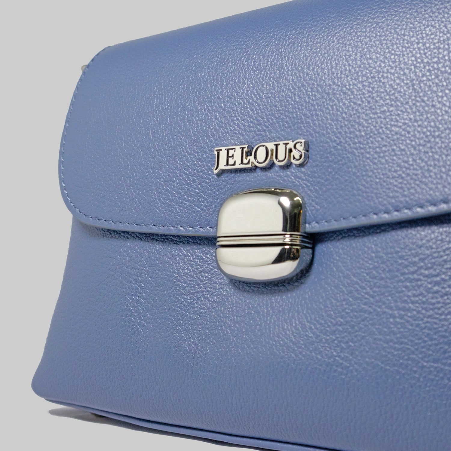 JELOUS Cortese luxury leather handbag in blue with silver turn-lock closure and detachable strap.